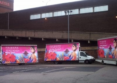 Three Advertising Vans Primark Blackburn Lancashire promoting store opening