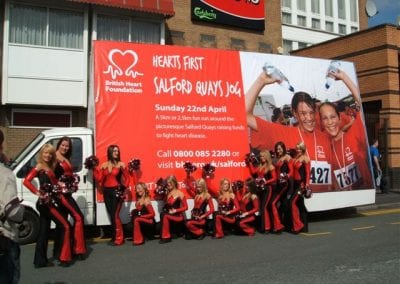 Poster Van British Heart Foundation Salford with Promotional Staff