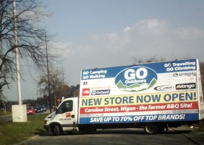 Advertising Van near busy main road advertising Go Outdoors new store opening near Wigan