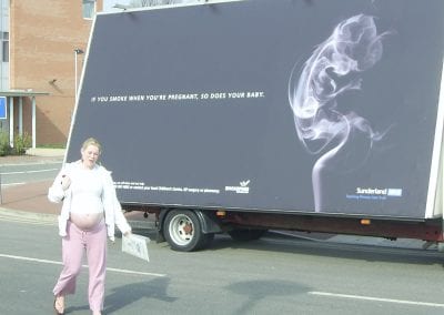 Mobile Billboard Advertising NHS Dont Smoke When Pregnant with expectant mother walking in front